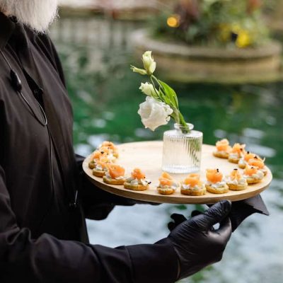 Cocktail hour hors d’oeuvres served beside the fountain during Michael & Andrew’s Villa Toscana Miami wedding.